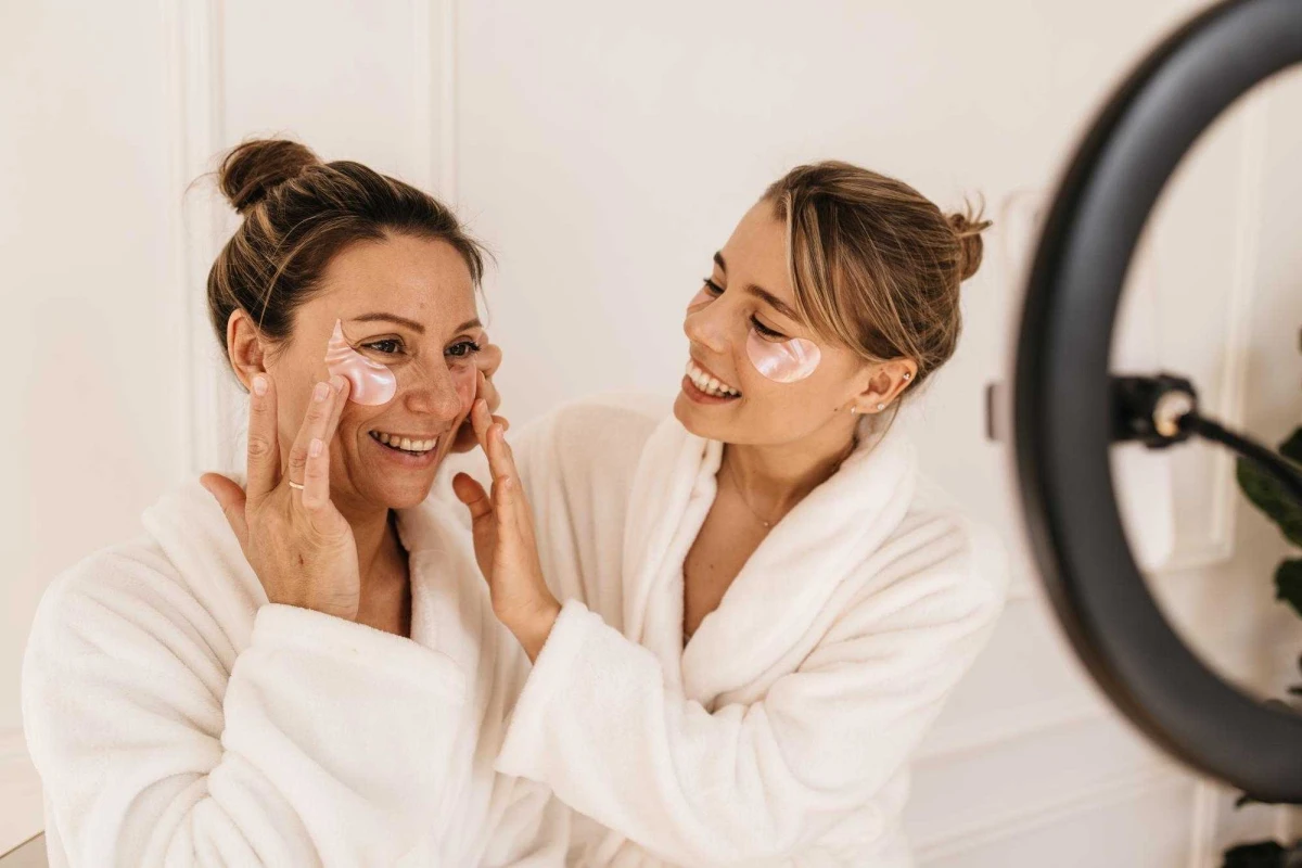 beautiful caucasian girls bathrobes struggle with bruises dark circles eyes with patches skin care health concept