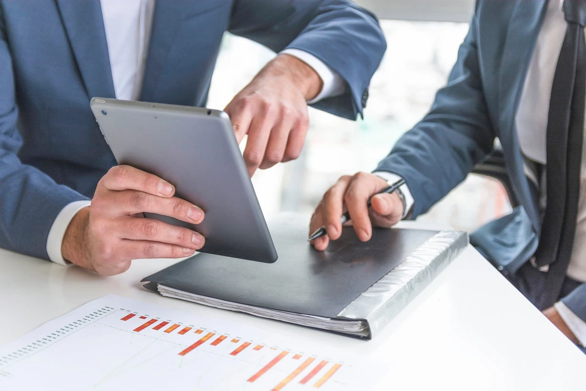 businessman discussing digital tablet workplace